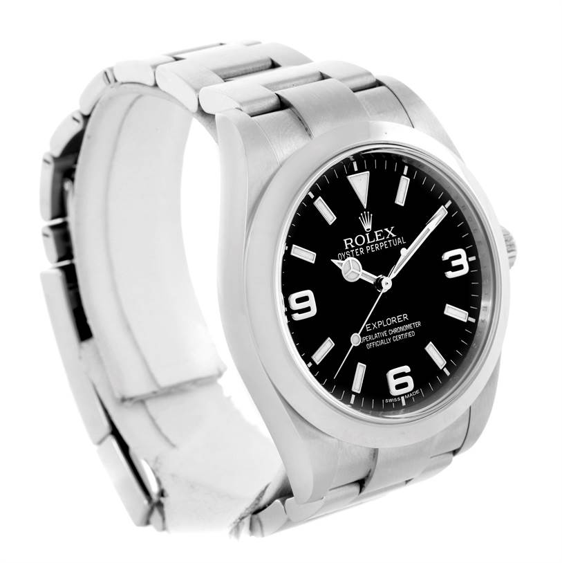 The Rolex Explorer 214270 Men's Stainless Steel Black Dial 214270 Men's Stainless Steel Black Dial watch is shown at a three-quarter angle, highlighting its face, bezel, and part of the bracelet.