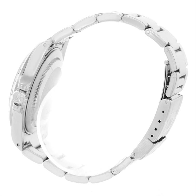 The image shows a side view of the Rolex Explorer 16570 Men's Stainless Steel White Dial 16570 Men's Stainless Steel White Dial, highlighting its bracelet, clasp, and crown.