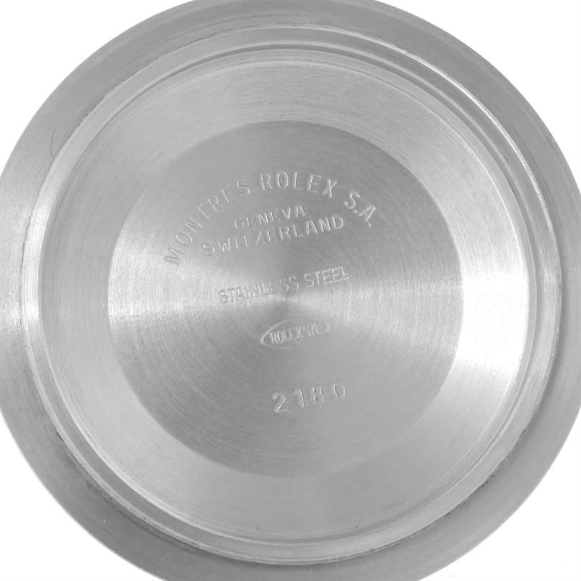 This is the inner case back of a Rolex Explorer 16570 Men's Stainless Steel White Dial 16570 Men's Stainless Steel White Dial model watch, showing engravings of brand details and specifications.