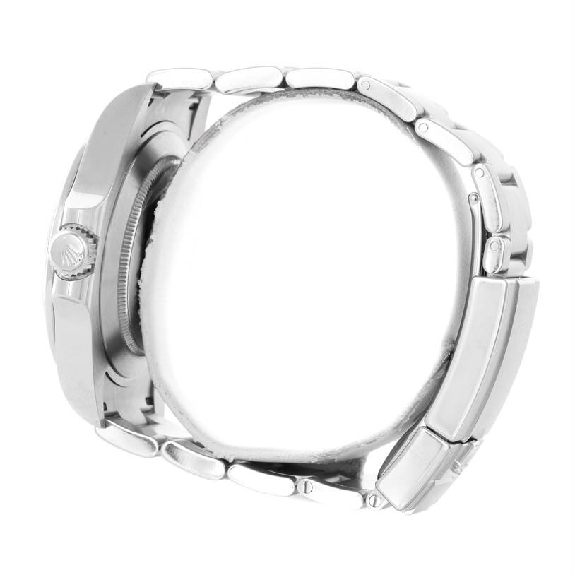 The image shows the side view of the Rolex Explorer 216570 Men's Stainless Steel Black Dial 216570 Men's Stainless Steel Black Dial watch, focusing on the crown and bracelet.