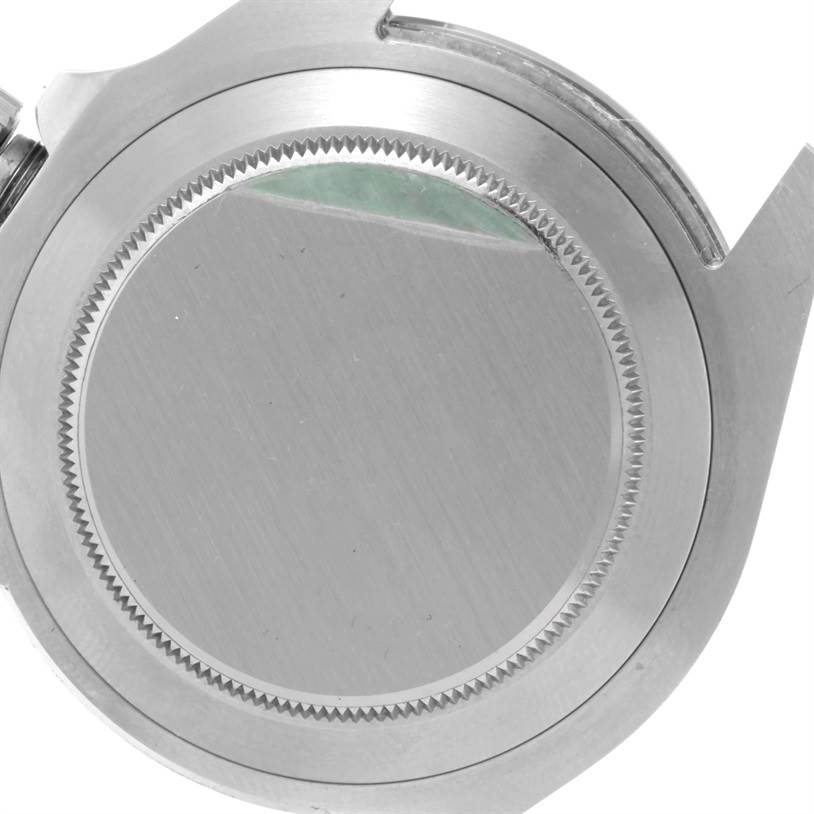 The image shows the caseback of a Rolex Explorer 216570 Men's Stainless Steel Black Dial 216570 Men's Stainless Steel Black Dial watch, taken from a close-up angle.