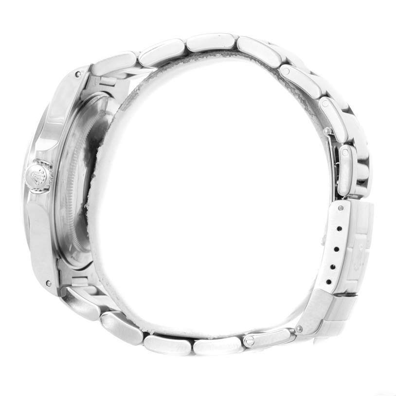 The image shows a side view of a Rolex Explorer 16570 Men's Stainless Steel White Dial 16570 Men's Stainless Steel White Dial watch, primarily highlighting its bracelet and clasp.