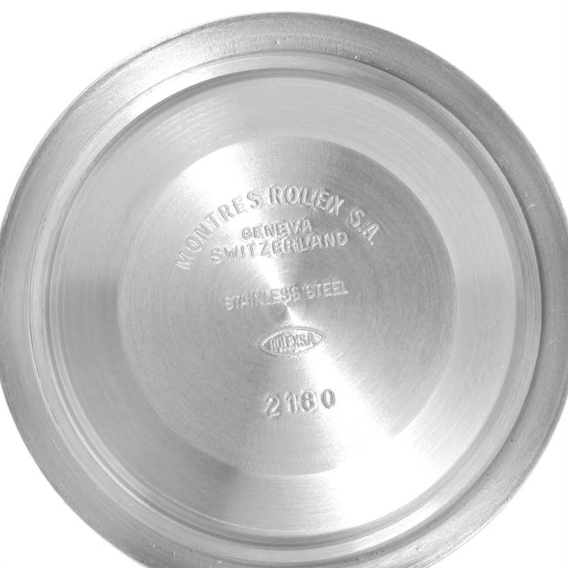 This image shows the inside of the case back of a Rolex Explorer 16570 Men
s Stainless Steel White Dial 16570 Men
s Stainless Steel White Dial watch, displaying brand markings and material information.
