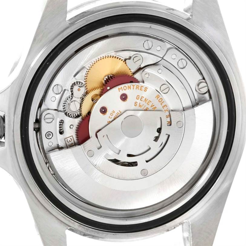 The image shows the internal mechanism of the Rolex Explorer 16570 Men
s Stainless Steel White Dial 16570 Men
s Stainless Steel White Dial model, focusing on its intricate gears and components.