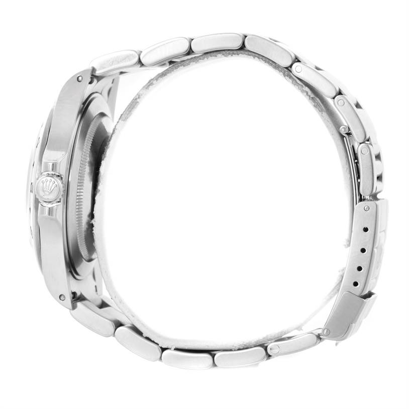 This image shows a side view of the Rolex Explorer 16570 Men
s Stainless Steel White Dial 16570 Men
s Stainless Steel White Dial watch, focusing on its case, crown, and bracelet.