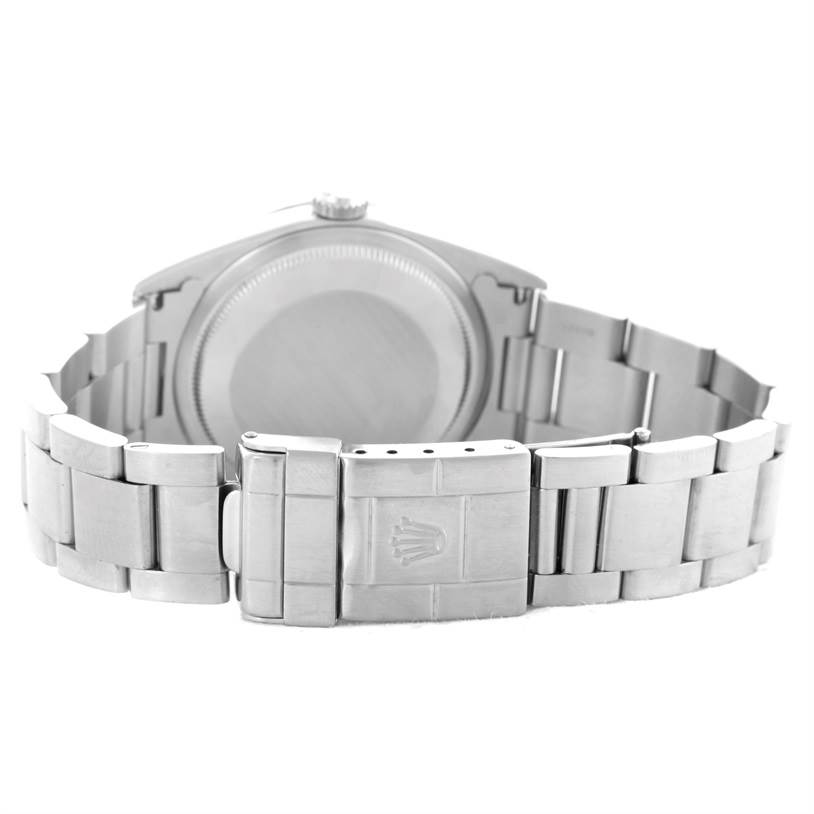 The image shows the back view of the Rolex Explorer 14270 Men's Stainless Steel Black Dial 14270 Men's Stainless Steel Black Dial watch, showcasing its Oystersteel case and bracelet with a closed clasp.