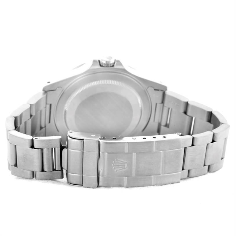 The image shows the back view of the Rolex Explorer 16570 Men
s Stainless Steel White Dial 16570 Men
s Stainless Steel White Dial
s case and bracelet with the clasp open.