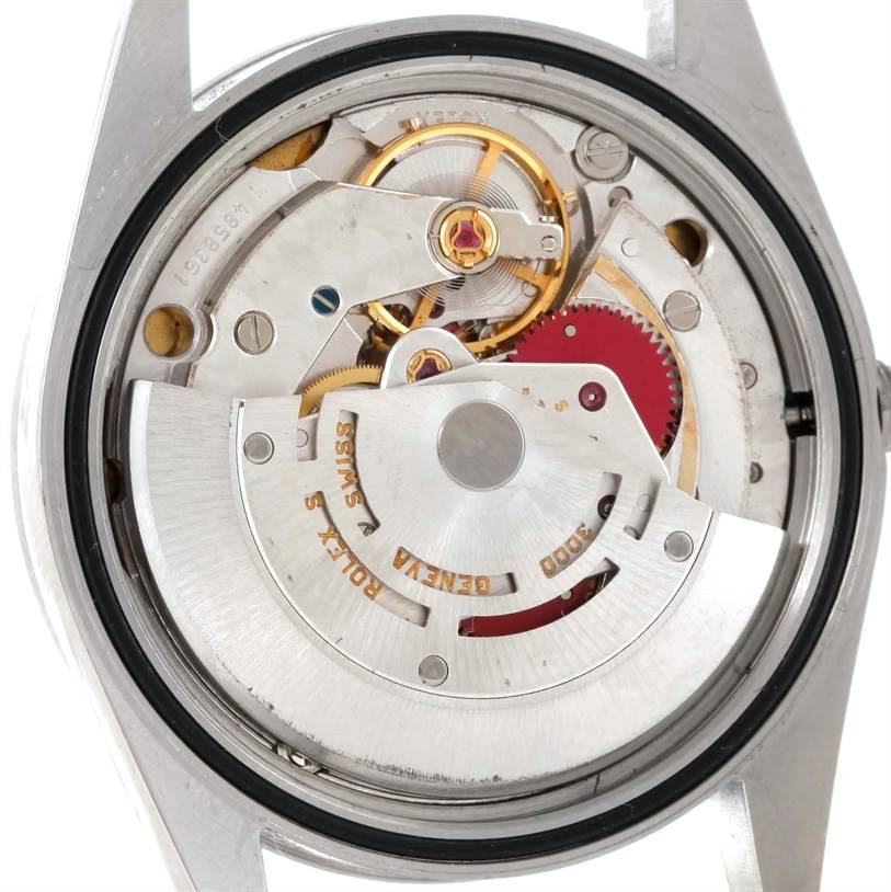 The image shows the inner mechanism of a Rolex Explorer 14270 Men's Stainless Steel Black Dial 14270 Men's Stainless Steel Black Dial watch from a back angle, highlighting its movement and components.