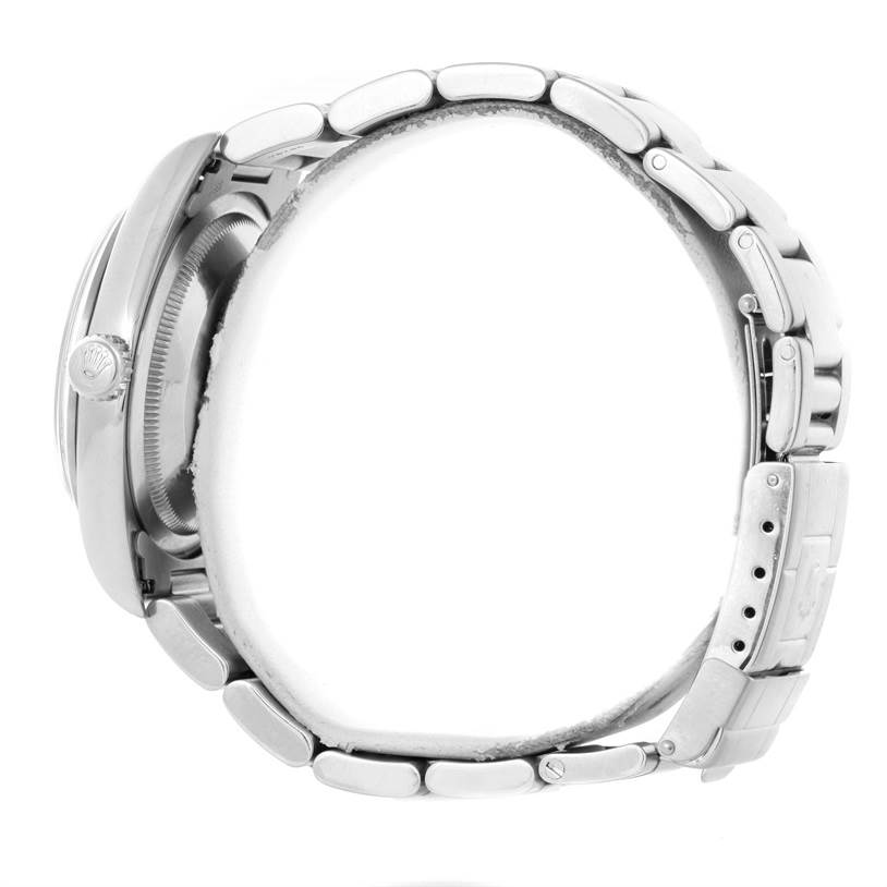 The image shows a side view of a Rolex Explorer 14270 Men's Stainless Steel Black Dial 14270 Men's Stainless Steel Black Dial model watch, focusing on the case, crown, and metal bracelet.