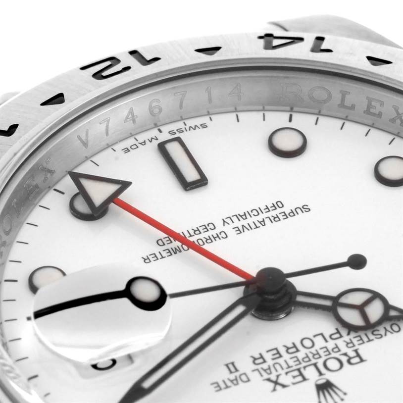 This close-up image of the Rolex Explorer 16570 Men
s Stainless Steel White Dial 16570 Men
s Stainless Steel White Dial watch shows the dial, hands, and part of the bezel at an angle.