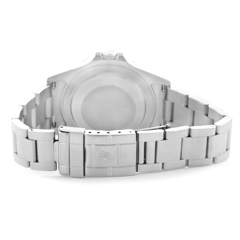 The image shows the backside of a Rolex Explorer 16570 Men
s Stainless Steel White Dial 16570 Men
s Stainless Steel White Dial watch, focusing on the case back and bracelet with clasp.