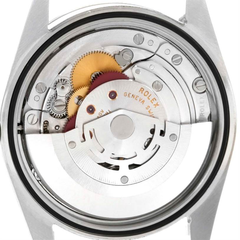 The image shows the movement mechanism of a Rolex Explorer 114270 Men's Stainless Steel Black Dial 114270 Men's Stainless Steel Black Dial watch from a back view with the case opened.