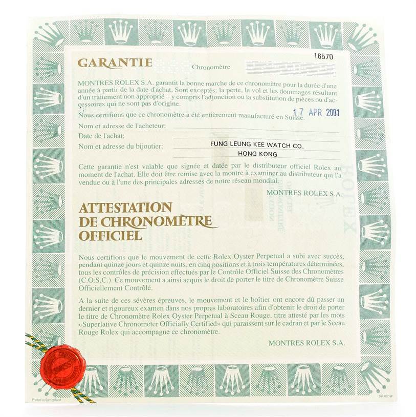 The image shows the warranty certificate for a Rolex Explorer 16570 Men's Stainless Steel White Dial 16570 Men's Stainless Steel White Dial watch.