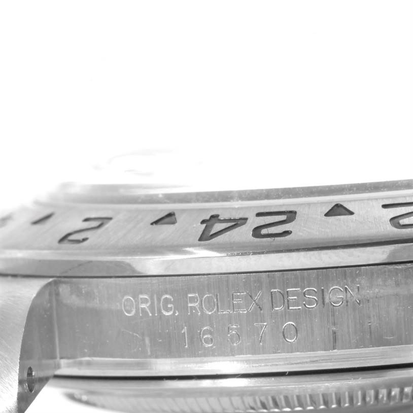 This close-up angle of the Rolex Explorer 16570 Men's Stainless Steel White Dial 16570 Men's Stainless Steel White Dial shows the side of the case with the engraved model number "16570" and part of the bezel.