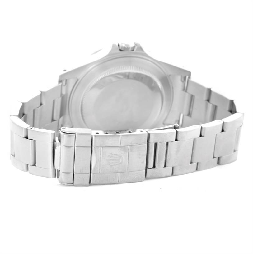 The image shows the rear view of a Rolex Explorer 16570 Men's Stainless Steel White Dial 16570 Men's Stainless Steel White Dial watch, highlighting its clasp and bracelet links.