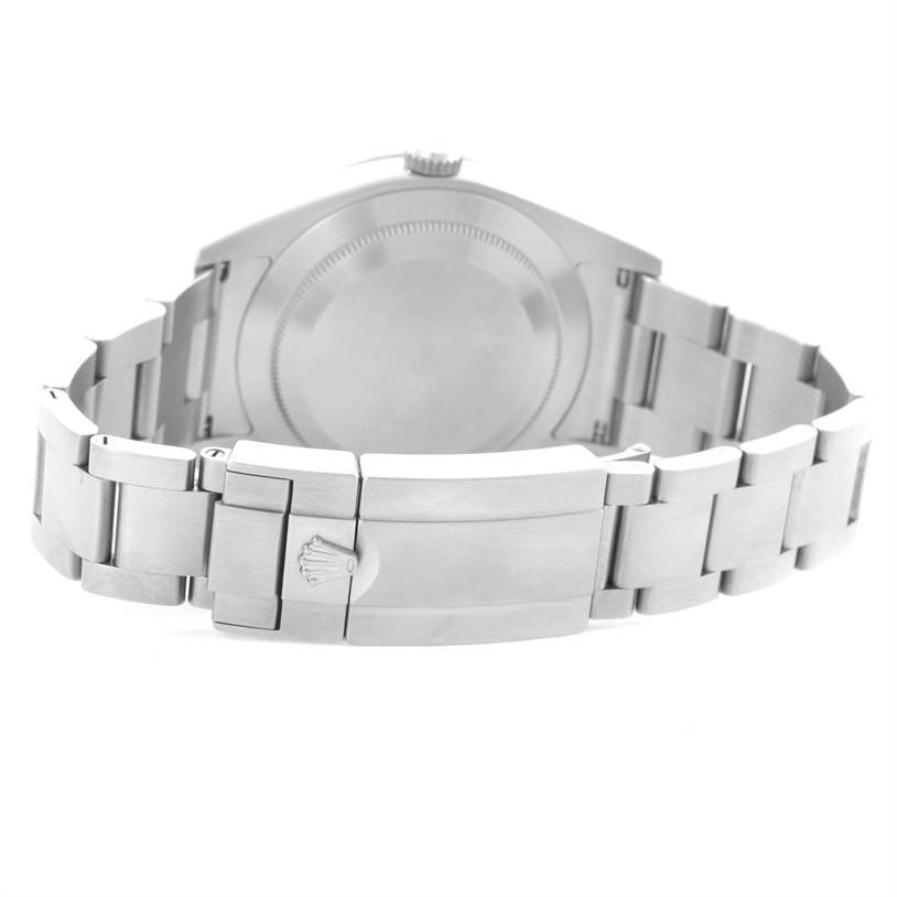 The image shows the back and clasp of a Rolex Explorer 214270 Men's Stainless Steel Black Dial 214270 Men's Stainless Steel Black Dial watch, featuring its stainless steel bracelet.