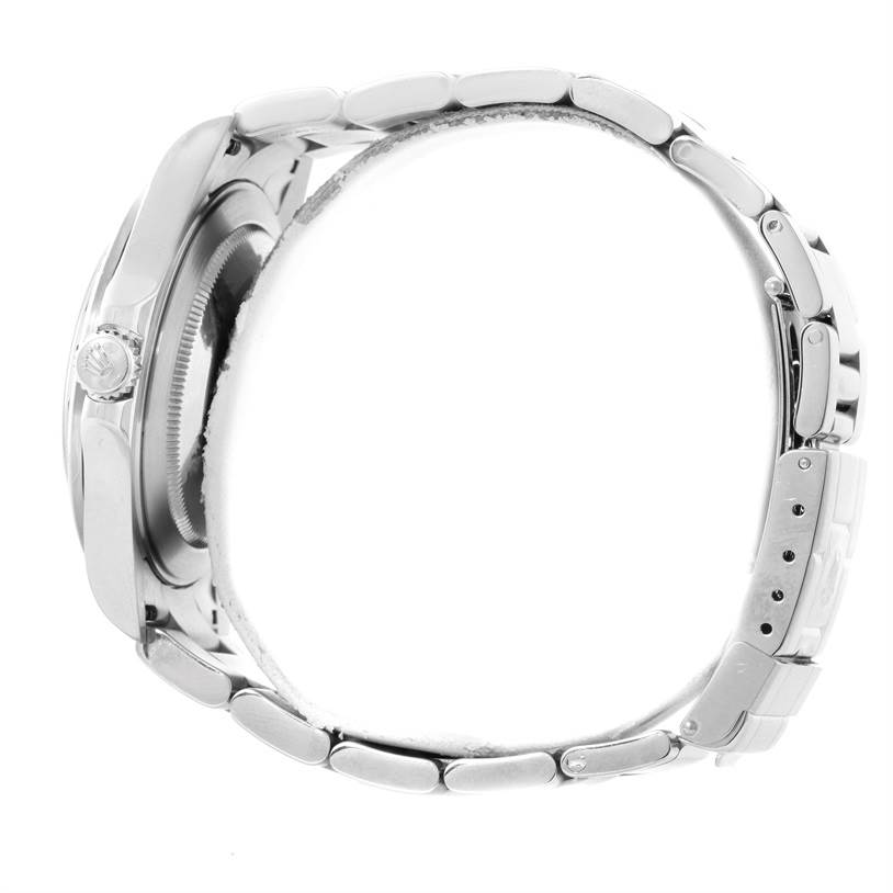 The image shows a side profile of the Rolex Explorer 16570 Men's Stainless Steel White Dial 16570 Men's Stainless Steel White Dial watch, highlighting its case, crown, and linked bracelet.