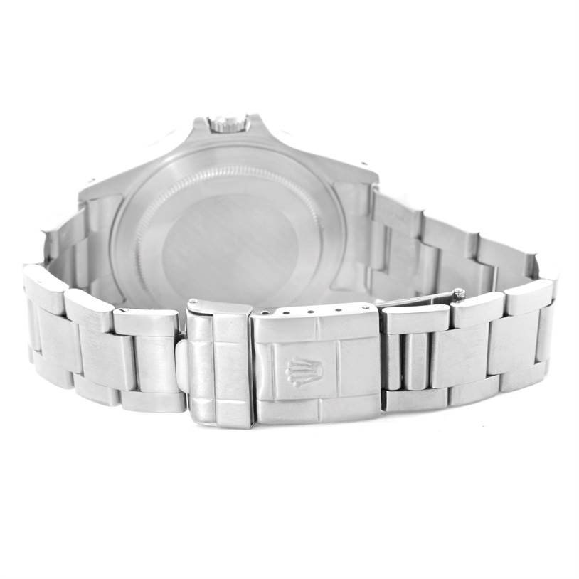 The image shows the back and clasp of a Rolex Explorer 16570 Men's Stainless Steel White Dial 16570 Men's Stainless Steel White Dial watch, highlighting its bracelet and case back.