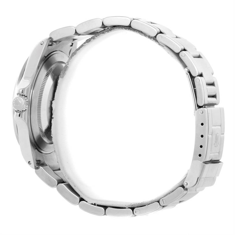 This image shows a side view of the Rolex Explorer 16570 Men's Stainless Steel White Dial 16570 Men's Stainless Steel White Dial watch, highlighting the case, crown, and bracelet.