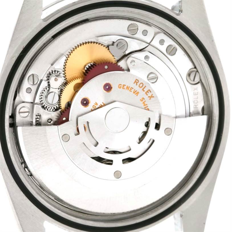The image shows a close-up view of the internal movement mechanism of a Rolex Explorer 114270 Men's Stainless Steel Black Dial 114270 Men's Stainless Steel Black Dial watch.