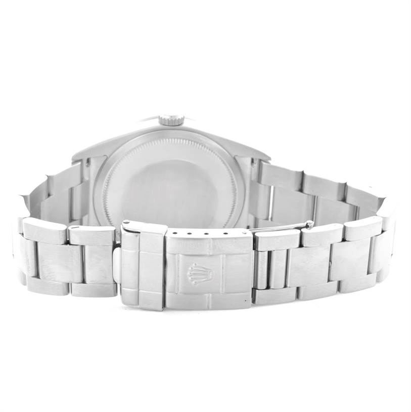 This image shows the back view of the Rolex Explorer 114270 Men's Stainless Steel Black Dial 114270 Men's Stainless Steel Black Dial, highlighting the case back and stainless steel bracelet with clasp.