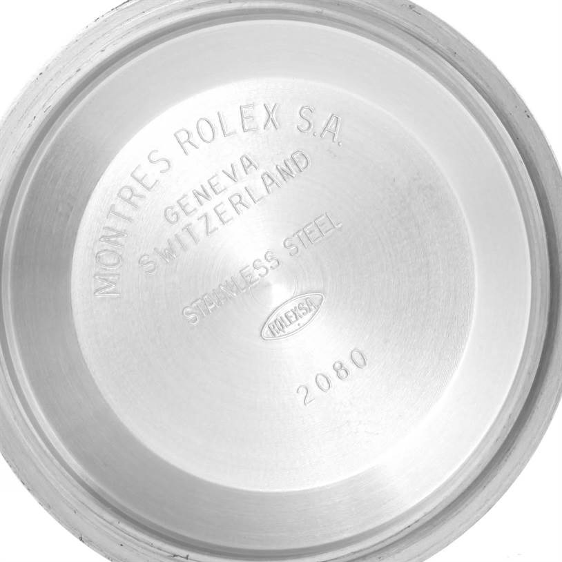 The image shows the underside of the case back of a Rolex Explorer 114270 Men's Stainless Steel Black Dial 114270 Men's Stainless Steel Black Dial watch, with brand engravings and model details.