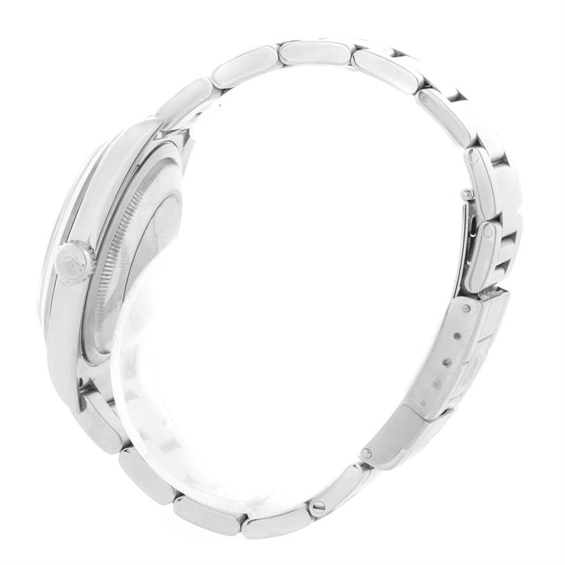 This side view of the Rolex Explorer 114270 Men's Stainless Steel Black Dial 114270 Men's Stainless Steel Black Dial watch shows the bracelet and the side of the case, including the crown and clasp.