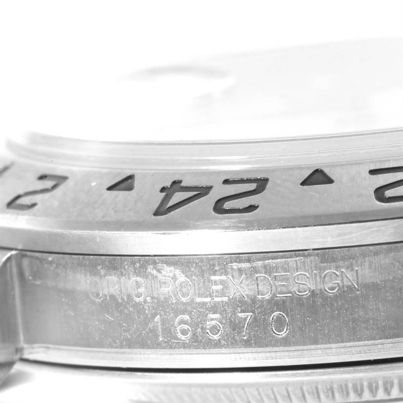 This image shows a close-up of the bezel and case side of a Rolex Explorer 16570 Men's Stainless Steel White Dial 16570 Men's Stainless Steel White Dial watch, model number 16570.