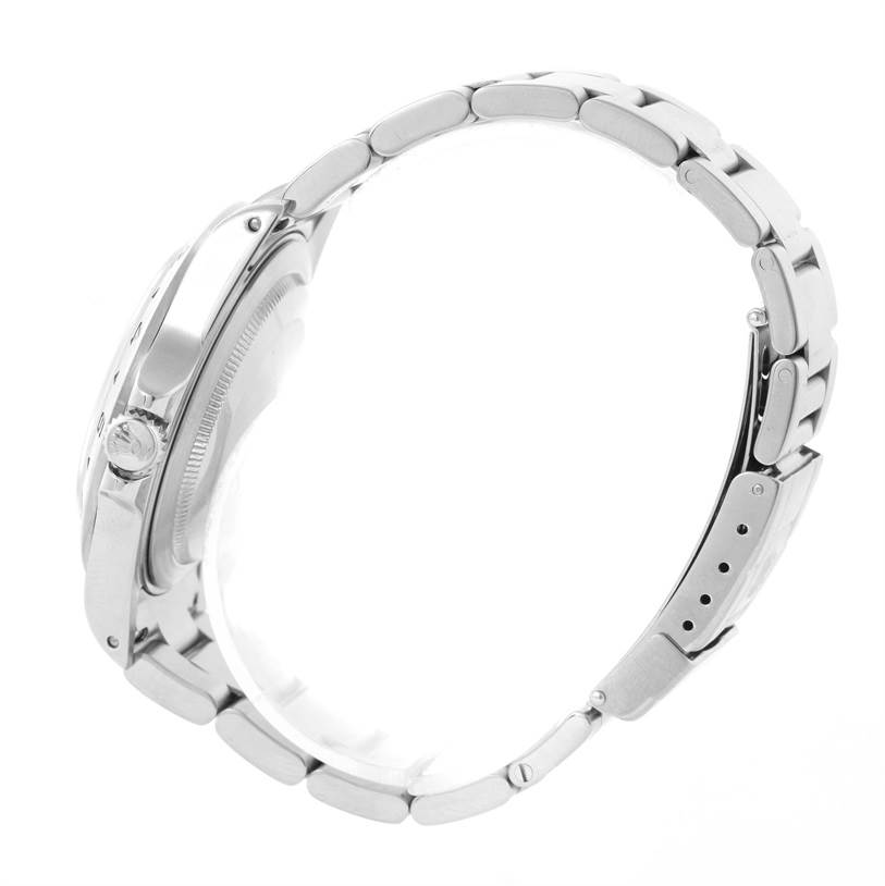 The side profile of a Rolex Explorer 16570 Men's Stainless Steel White Dial 16570 Men's Stainless Steel White Dial watch, featuring the crown, case, and bracelet.