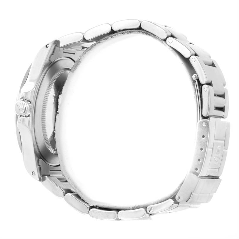 This image of a Rolex Explorer 16570 Men's Stainless Steel White Dial 16570 Men's Stainless Steel White Dial watch shows the side view, focusing on the bracelet, clasp, and part of the case.