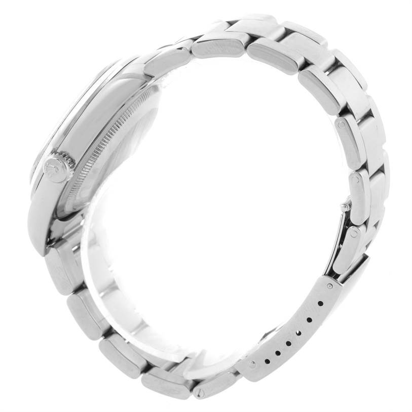 The image shows the Rolex Explorer 14270 Men's Stainless Steel Black Dial 14270 Men's Stainless Steel Black Dial watch from a side view, highlighting the crown, case, and bracelet.