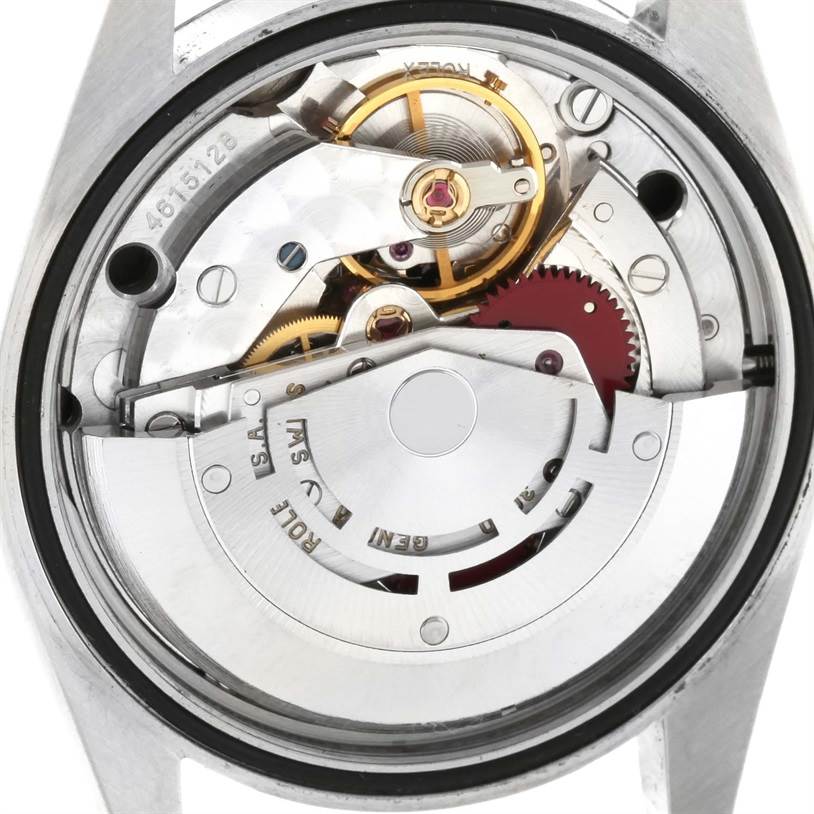 This image shows the inner workings of a Rolex Explorer 14270 Men's Stainless Steel Black Dial 14270 Men's Stainless Steel Black Dial watch from a back angle, highlighting its mechanical movement components.