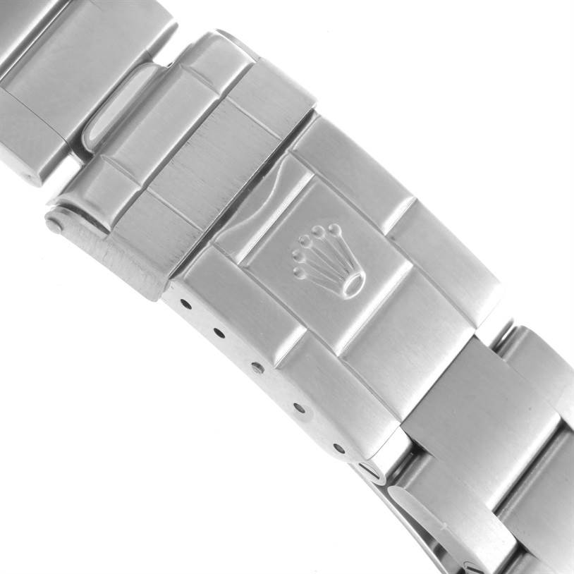 This image shows a close-up of the clasp and part of the bracelet of a Rolex Explorer 16570 Men's Stainless Steel White Dial 16570 Men's Stainless Steel White Dial watch.