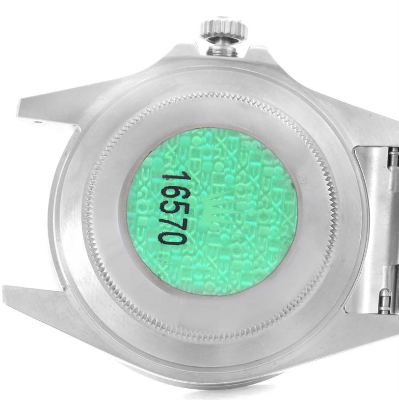 This image shows the case back of a Rolex Explorer 16570 Men's Stainless Steel White Dial 16570 Men's Stainless Steel White Dial model, viewed from the bottom side.