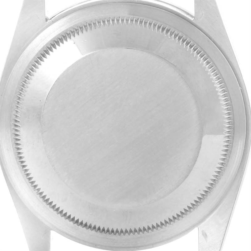 The image shows the back case and part of the lugs of a Rolex Explorer 14270 Men's Stainless Steel Black Dial 14270 Men's Stainless Steel Black Dial watch.