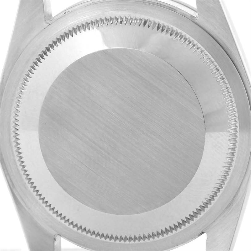 This image shows the case back of a Rolex Explorer 114270 Men's Stainless Steel Black Dial 114270 Men's Stainless Steel Black Dial watch viewed from the back.