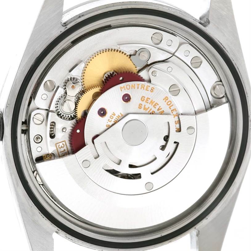 This image shows the inner mechanics of a Rolex Explorer 114270 Men's Stainless Steel Black Dial 114270 Men's Stainless Steel Black Dial watch from the back view.