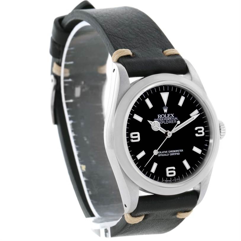 The Rolex Explorer 14270 Men's Stainless Steel Black Dial 14270 Men's Stainless Steel Black Dial watch is shown at an angled side view, displaying the face, bezel, crown, and leather strap.