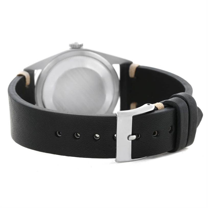 The image shows the back casing, strap, and buckle of a Rolex Explorer 14270 Men's Stainless Steel Black Dial 14270 Men's Stainless Steel Black Dial watch from a rear angle.