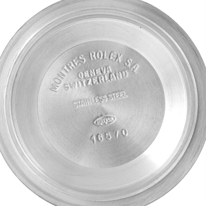 This image shows the inner case back of a Rolex Explorer 16570 Men's Stainless Steel Silver Dial 16570 Men's Stainless Steel Silver Dial watch, displaying model number 16570 and other engravings.