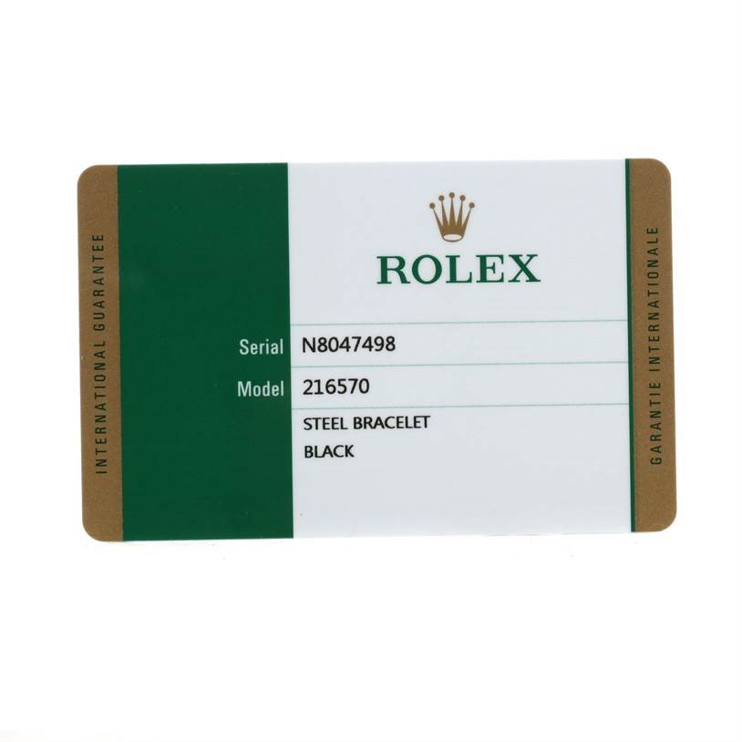 This image shows the international guarantee card for the Rolex Explorer 216570 Men's Stainless Steel Black Dial 216570 Men's Stainless Steel Black Dial model 216570 with a black steel bracelet.