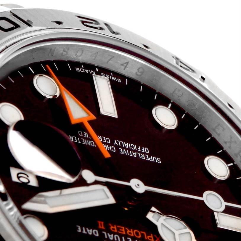 The image shows a close-up of the Rolex Explorer 216570 Men's Stainless Steel Black Dial 216570 Men's Stainless Steel Black Dial watch face, highlighting the bezel, hour markers, hands, and part of the cyclops lens.