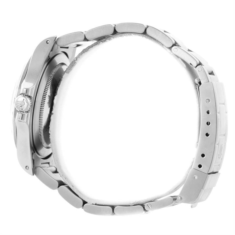 The image shows a Rolex Explorer 16570 Men's Stainless Steel White Dial 16570 Men's Stainless Steel White Dial watch in a side profile, highlighting its case, crown, and metallic bracelet.