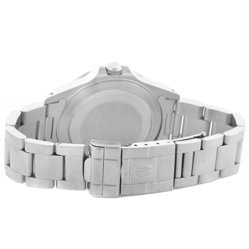 The image shows the back side of a Rolex Explorer 16570 Men's Stainless Steel White Dial 16570 Men's Stainless Steel White Dial watch, focusing on the case back and the bracelet clasp.