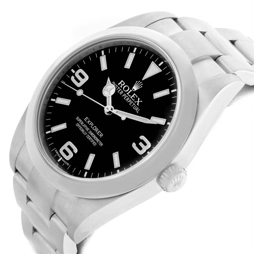 The Rolex Explorer 214270 Men's Stainless Steel Black Dial 214270 Men's Stainless Steel Black Dial watch is shown at a slight angle, highlighting its dial, bezel, and part of the metal bracelet.