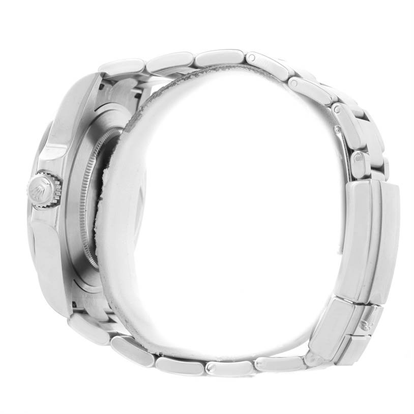 This side view of the Rolex Explorer 216570WSO Men's Stainless Steel White Dial 216570WSO Men's Stainless Steel White Dial watch shows the crown, part of the case, and the stainless steel bracelet.