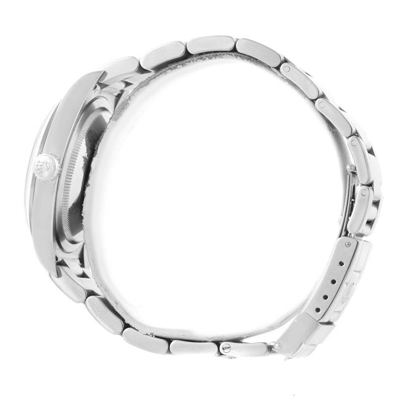 The image shows a side view of the Rolex Explorer 114270 Men's Stainless Steel Black Dial 114270 Men's Stainless Steel Black Dial watch, focusing on the case, crown, and metal bracelet.