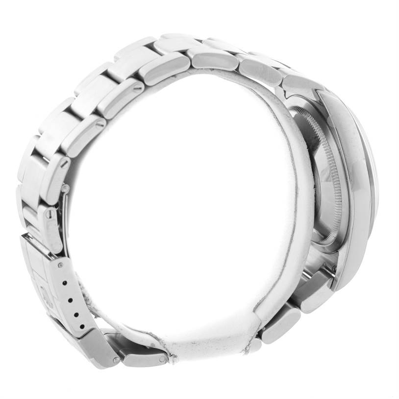 The image shows a side view of the Rolex Explorer 114270 Men's Stainless Steel Black Dial 114270 Men's Stainless Steel Black Dial watch, highlighting its band and the edge of the watch case.