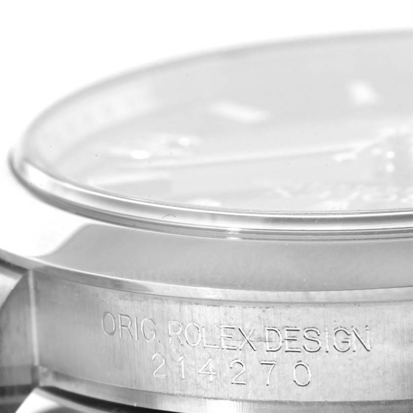 This image shows a close-up of the side engraving on the case of a Rolex Explorer 214270 Men's Stainless Steel Black Dial 214270 Men's Stainless Steel Black Dial model, highlighting "ORIG. ROLEX DESIGN 214270."