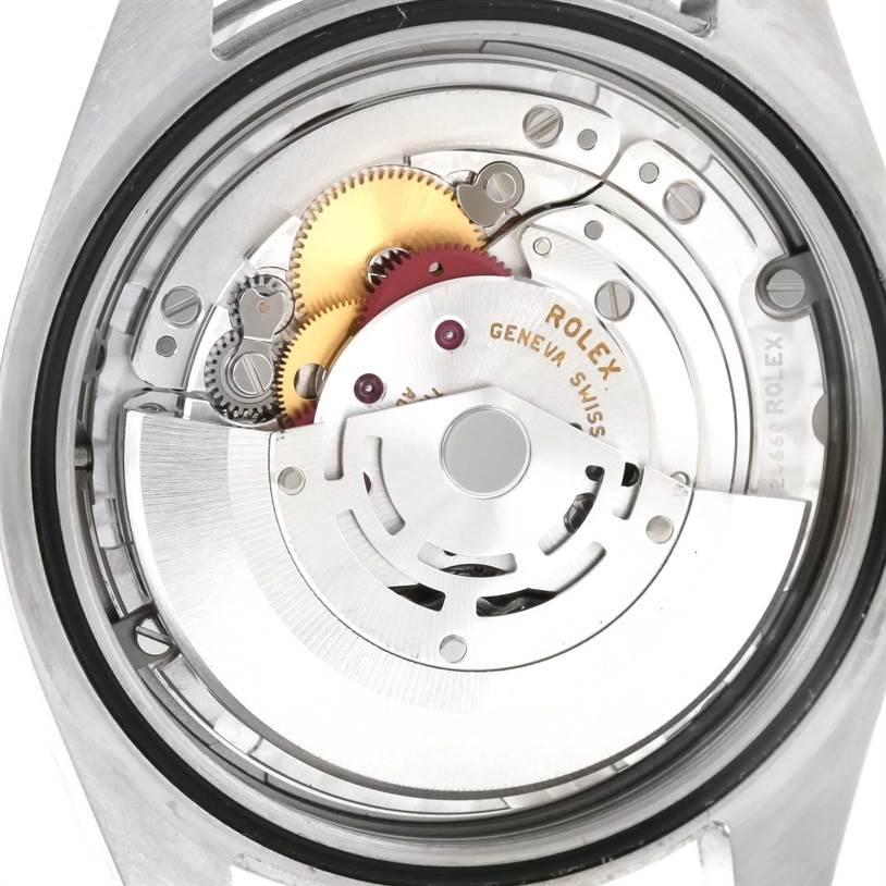 This image shows the internal mechanism of a Rolex Explorer 214270 Men's Stainless Steel Black Dial 214270 Men's Stainless Steel Black Dial watch, including gears and the rotor.